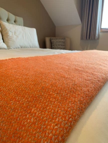 Illusion Throw in Pumpkin and Grey